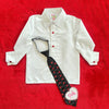 White button-up girls' shirt with red buttons and a black adjustable tie featuring heart embroidery and "Posh" appliqué